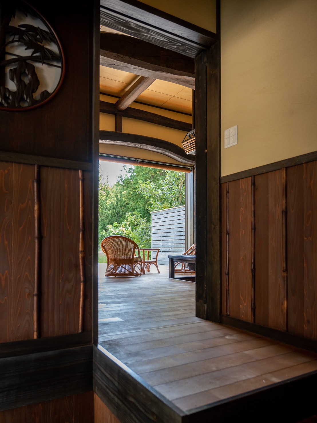 Entrance with original dark timber frame opening to outdoor deck