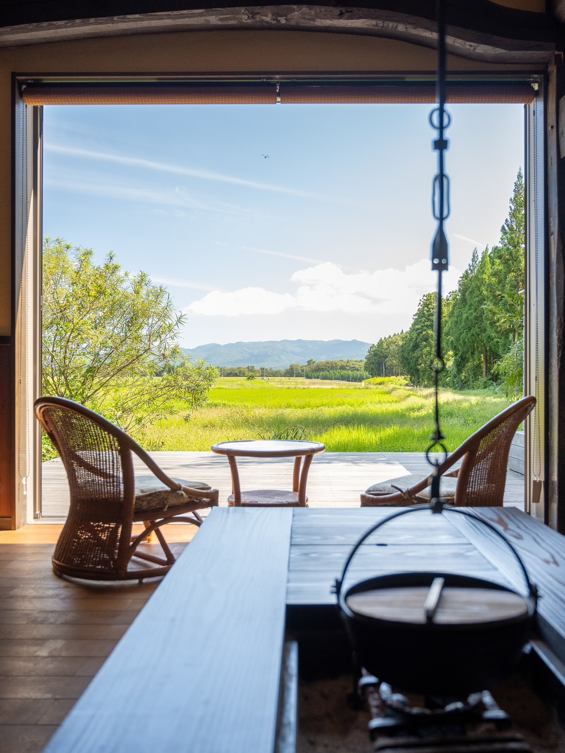 View from Asahi Sado across rice paddies toward Sado's mountains
